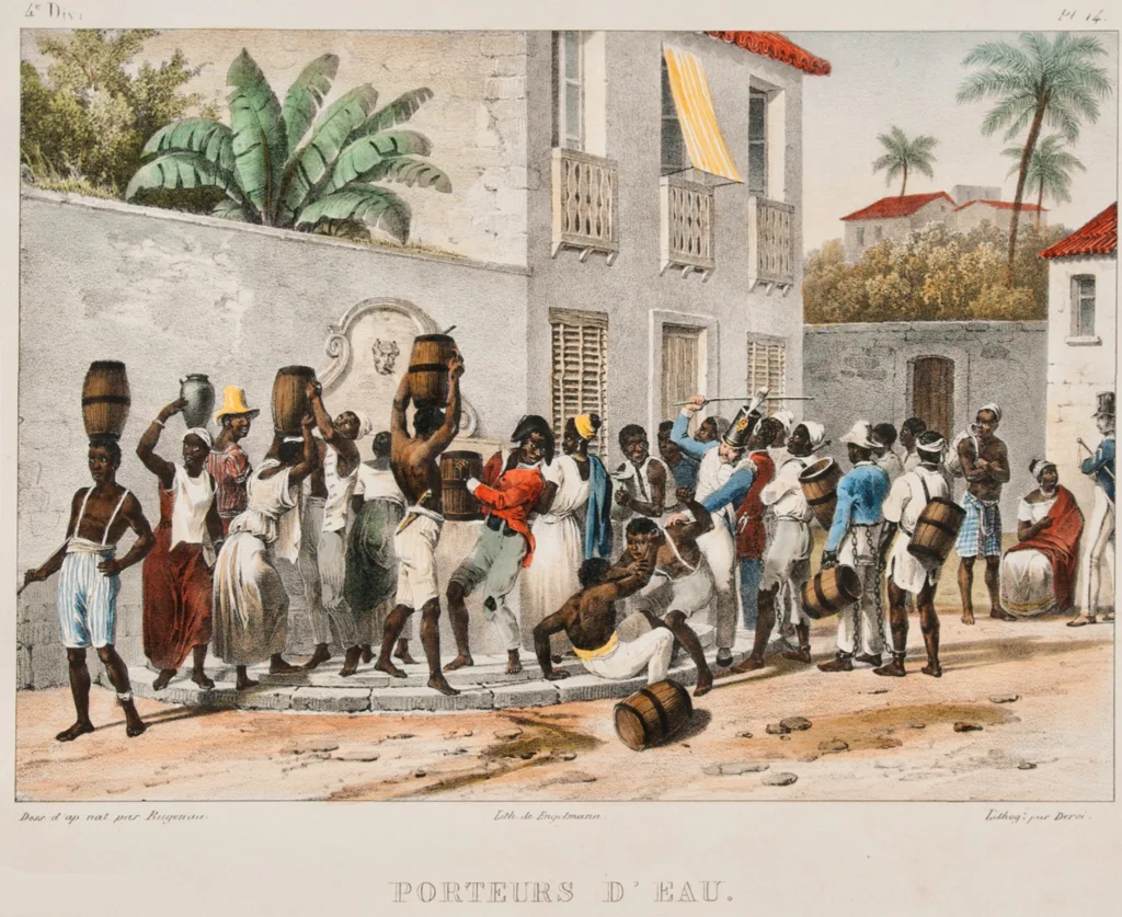 Aguadeiros do Largo do Paço Em “Aguadeiros do Largo do Paço”, Rugendas mostra dois homens negros em conflito, reprimidos por um soldado. A cena revela o controle cotidiano sobre os corpos escravizados nas cidades e a exploração disfarçada do trabalho urbano no Brasil imperial. Foto: reprodução/Facebook