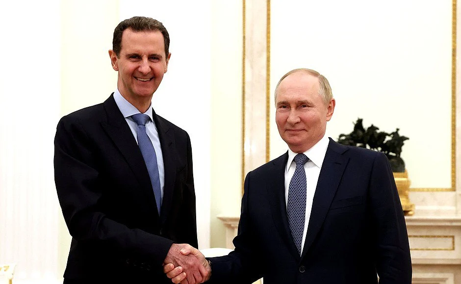 Bashar Al-Assad, ex-presidente da Síria, com Vladimir Putin